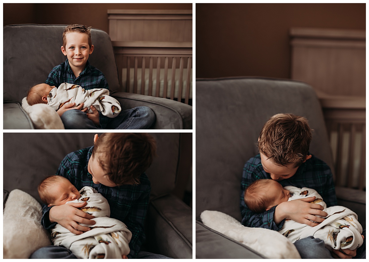 big brother holds new baby sitting in rocking chair by Denver newborn photographer